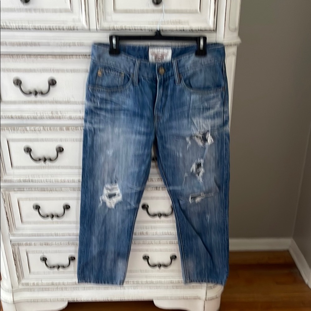 Distressed Blue Jeans